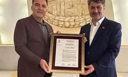 Halil Fırat’tan Hüseyin Büyükfırat’a Şükran Plaketi