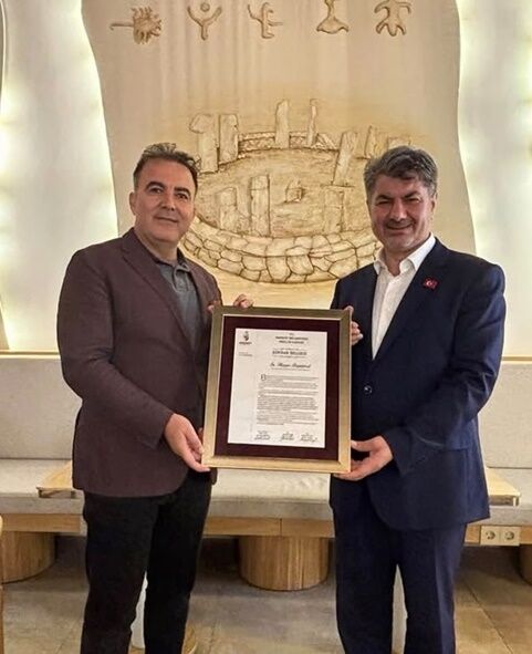 Halil Fırat’tan Hüseyin Büyükfırat’a Şükran Plaketi